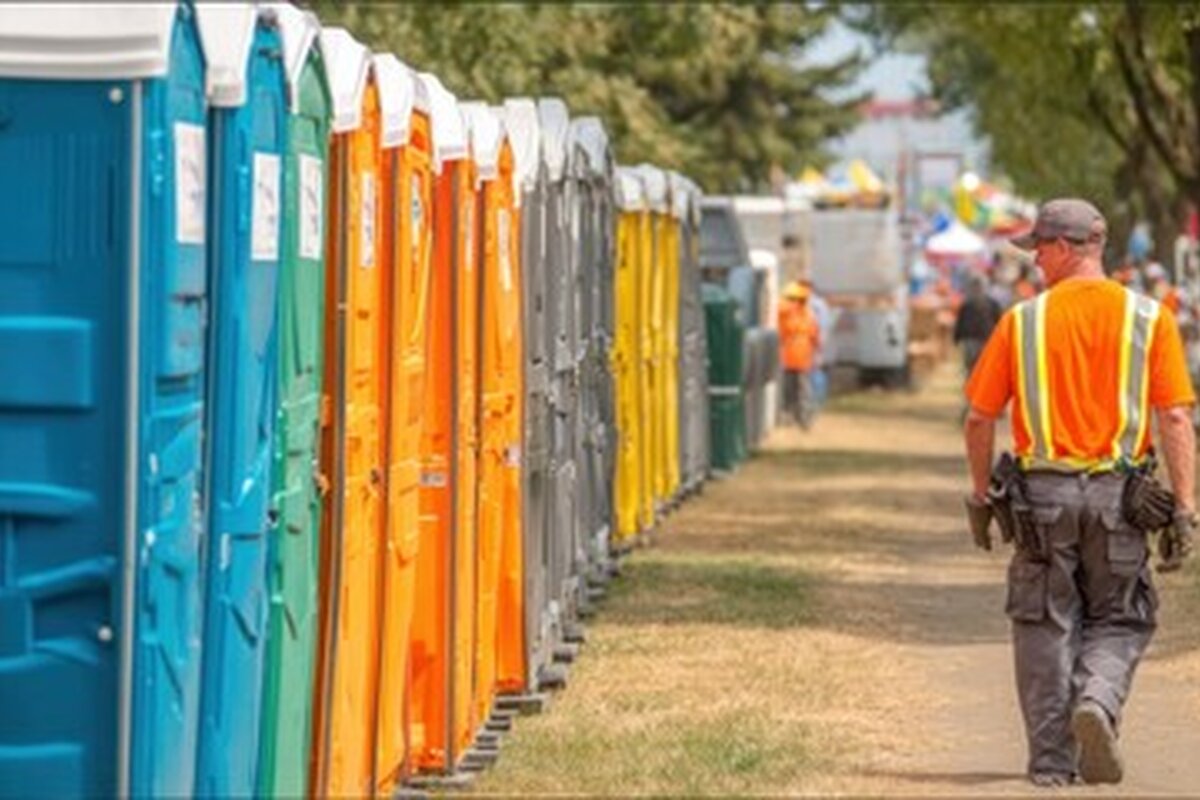Row of clean portable restrooms ready for an event